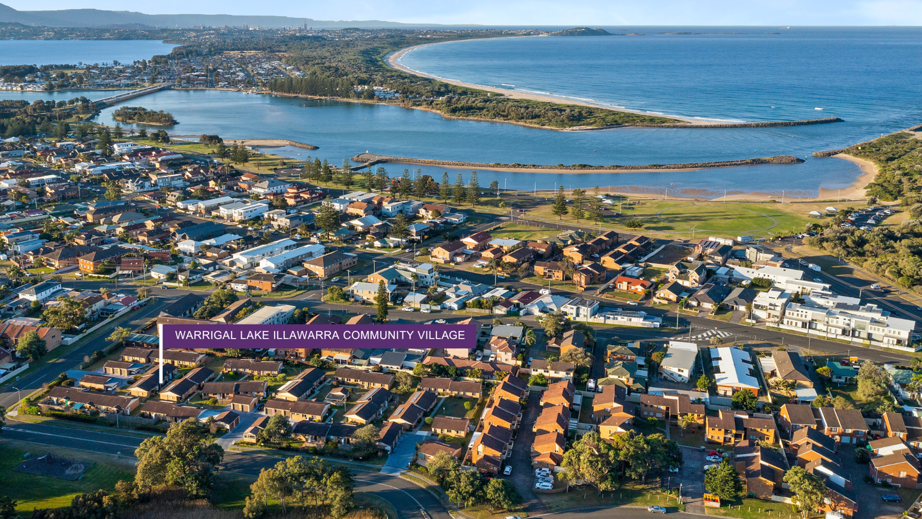 Aerial shot of Lake Illawarra including pin at Community Village