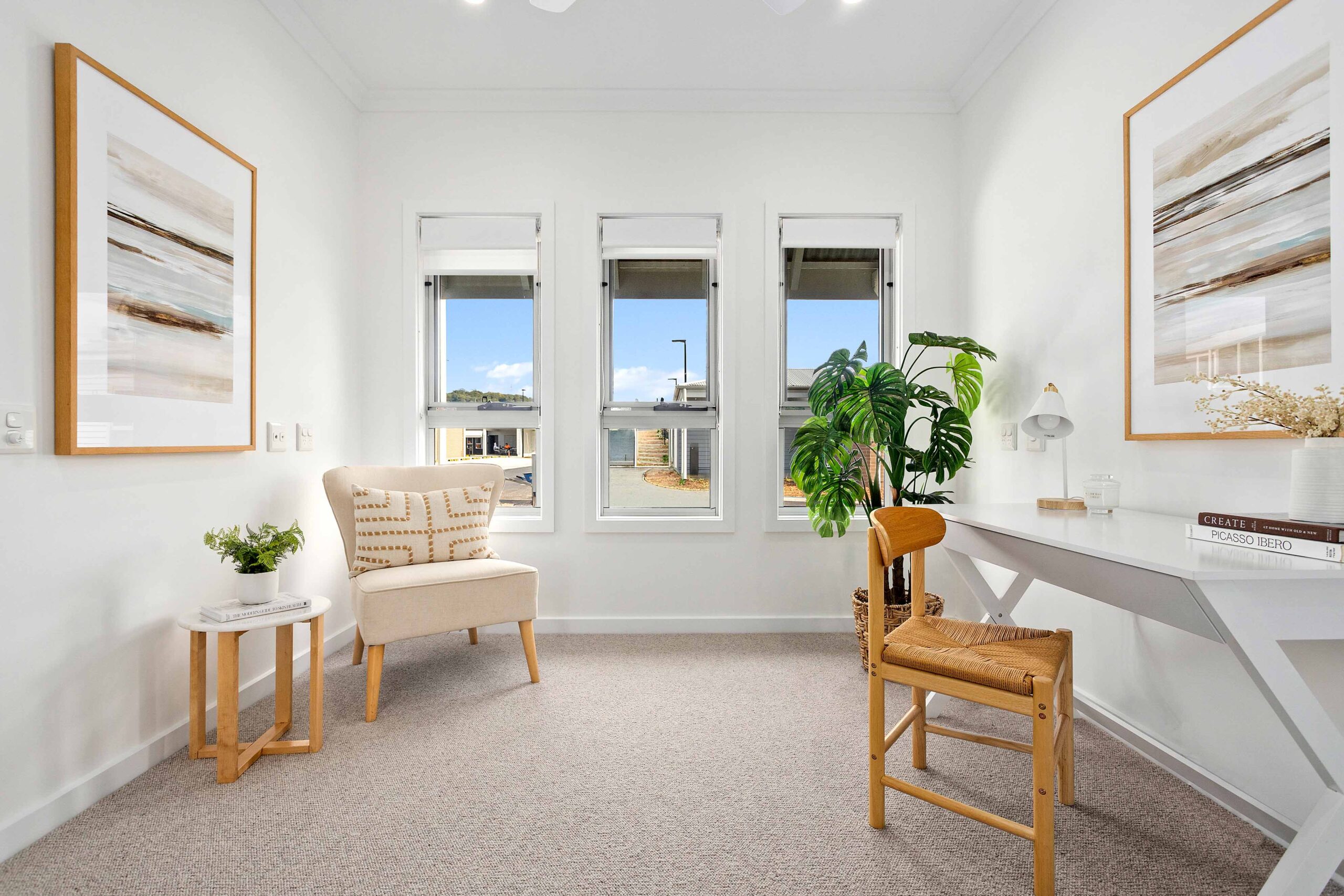 Warrigal Lake South office spare room shown with desk chairs and office furniture