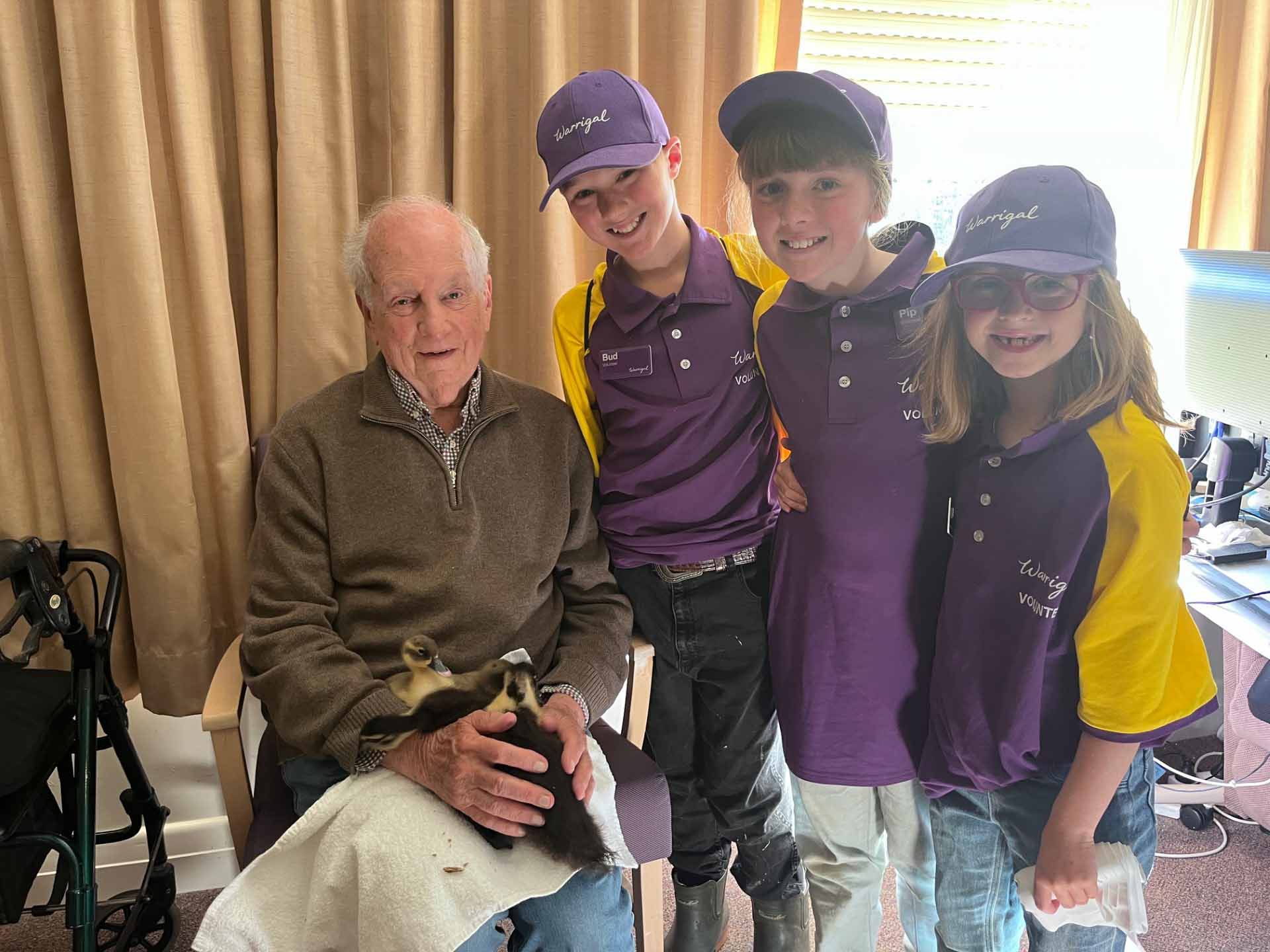Three young volunteers with Warrigal Bundanoon resident